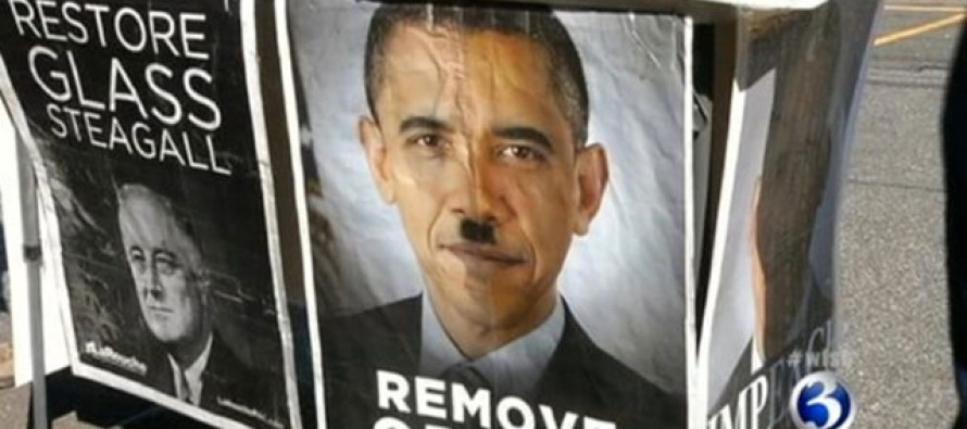 Obama’nın Hitler’e benzeyen posterlerini yırtan kadın tutuklandı