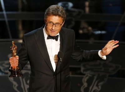 Director Pawel Pawlikowski holds his Oscar for best foreign language film "Ida" at the 87th Academy Awards in Hollywood, California